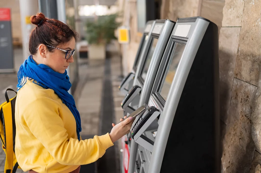 student using self-service terminal